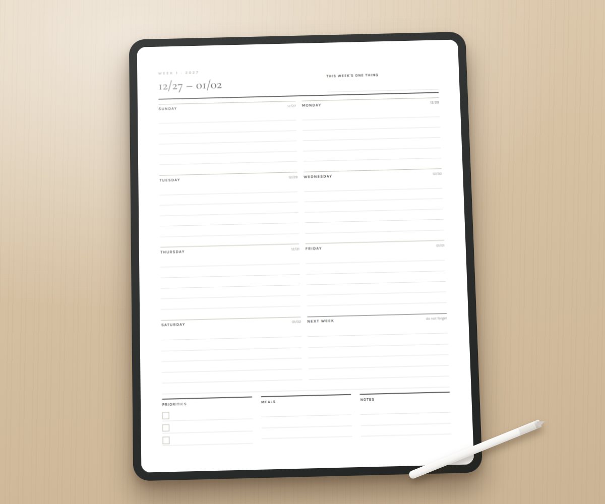The planner open on a tablet with a stylus